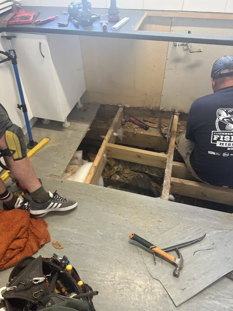 Vinyl Subfloor Repair — Massey — Damaged subfloor opened